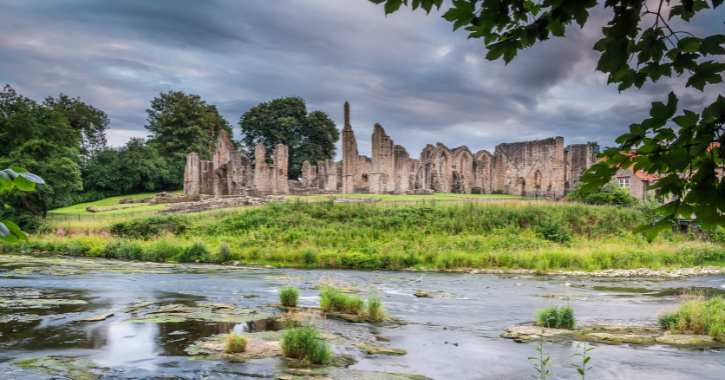 External view of Lindisfarne Priory and River Wear